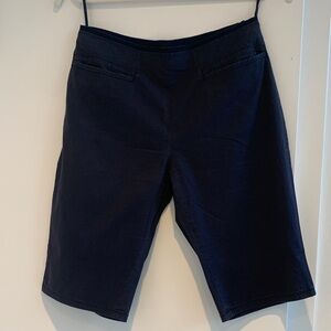 Miu Miu Women's Black Shorts, Made in Italy. Size 40. Slit front pockets.